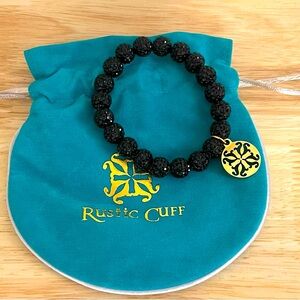 Black rustic cuff bracelet with gold charm